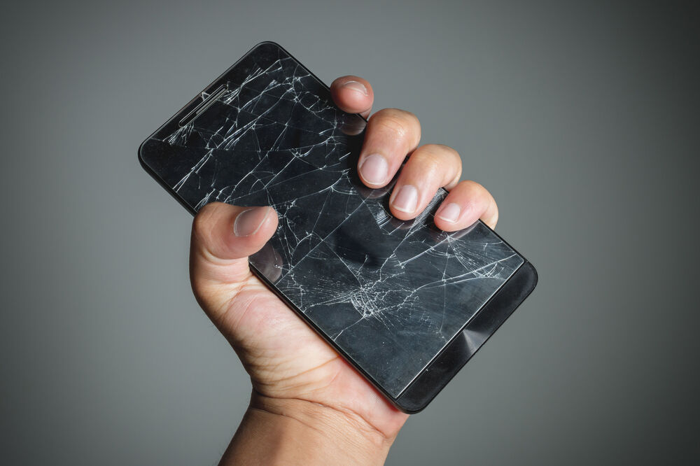 slomljeni telefon, Foto: Reuters