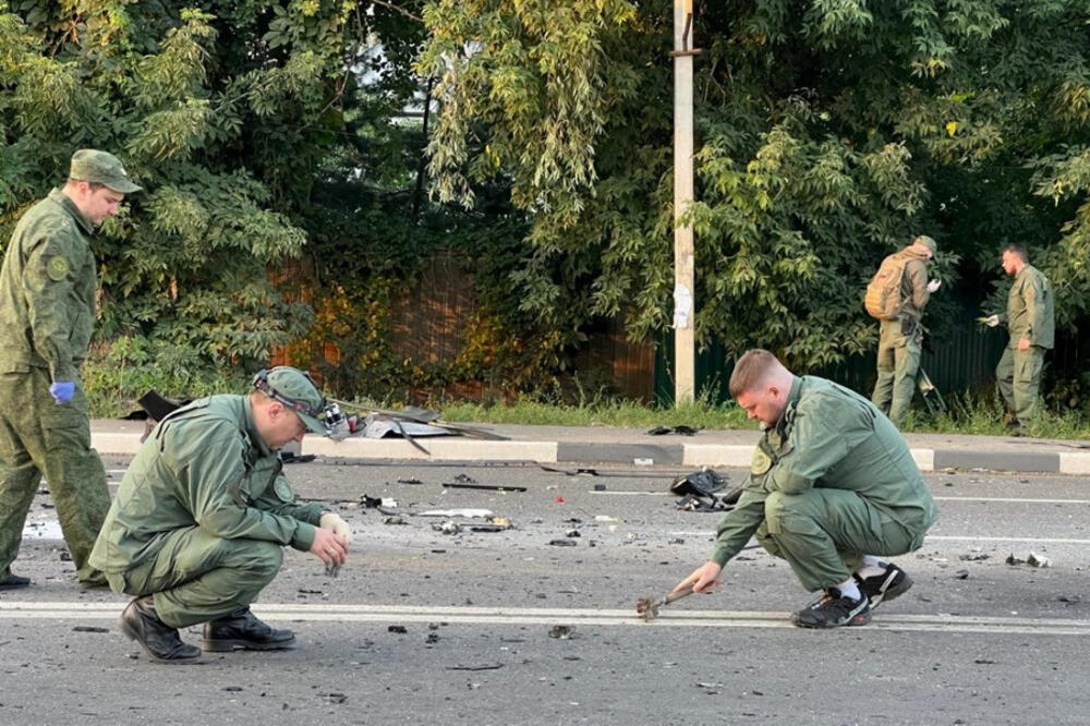 Istražitelji na mjestu gdje je došlo do eksplozije u kojoj je poginula Darja Dugina, Foto: REUTERS