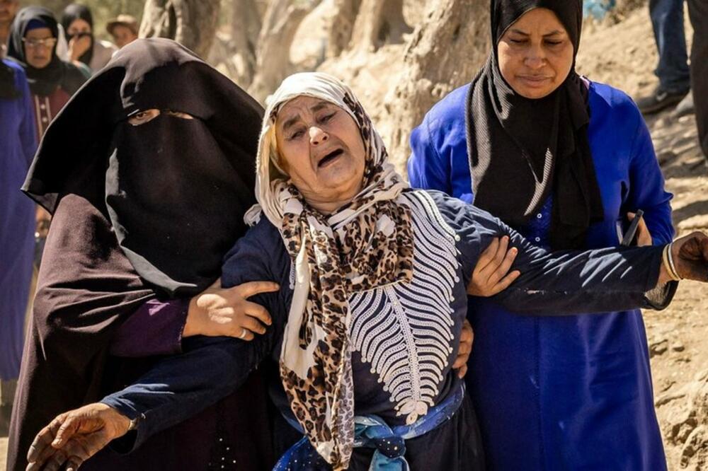 Žena u Maroku oplakuje poginule članove porodice, Foto: Getty Images