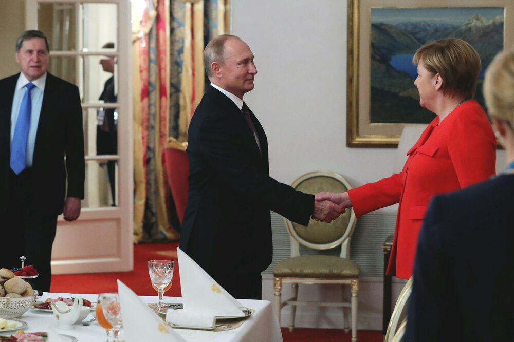Putin i Merkel, Foto: Reuters