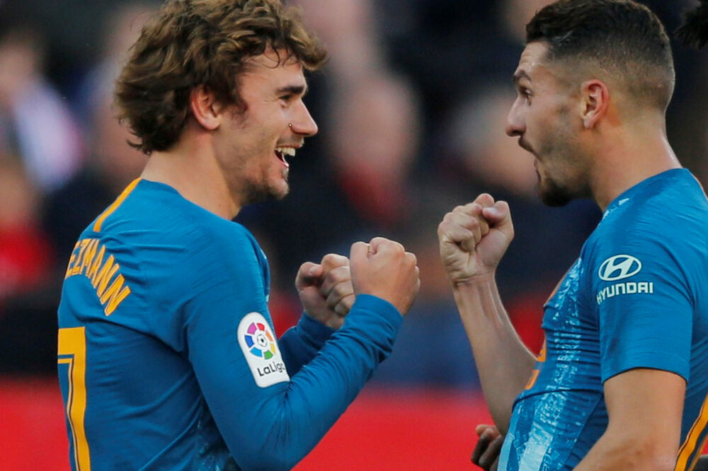 Grizman i Koke slave gol u Sevilji, Foto: Reuters