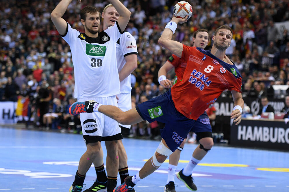 Nezaustavljiv: Pivot Norveške Bjarte Mirhol na utakmkici sa Njemačkom, Foto: ANNEGRET HILSE