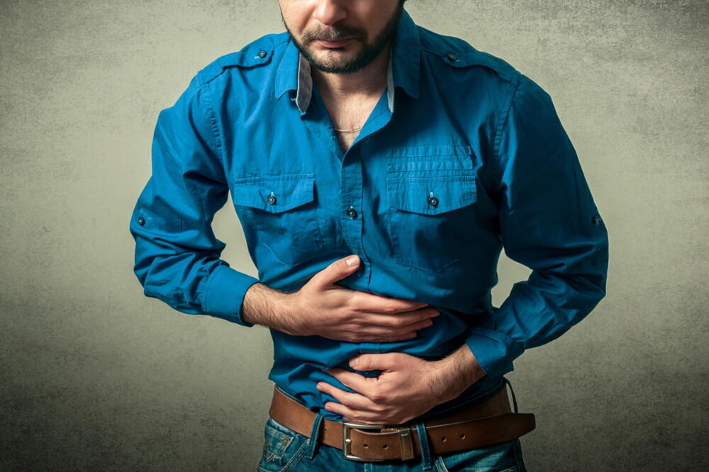 Trovanje hranom, bol u stomaku, Foto: Shutterstock