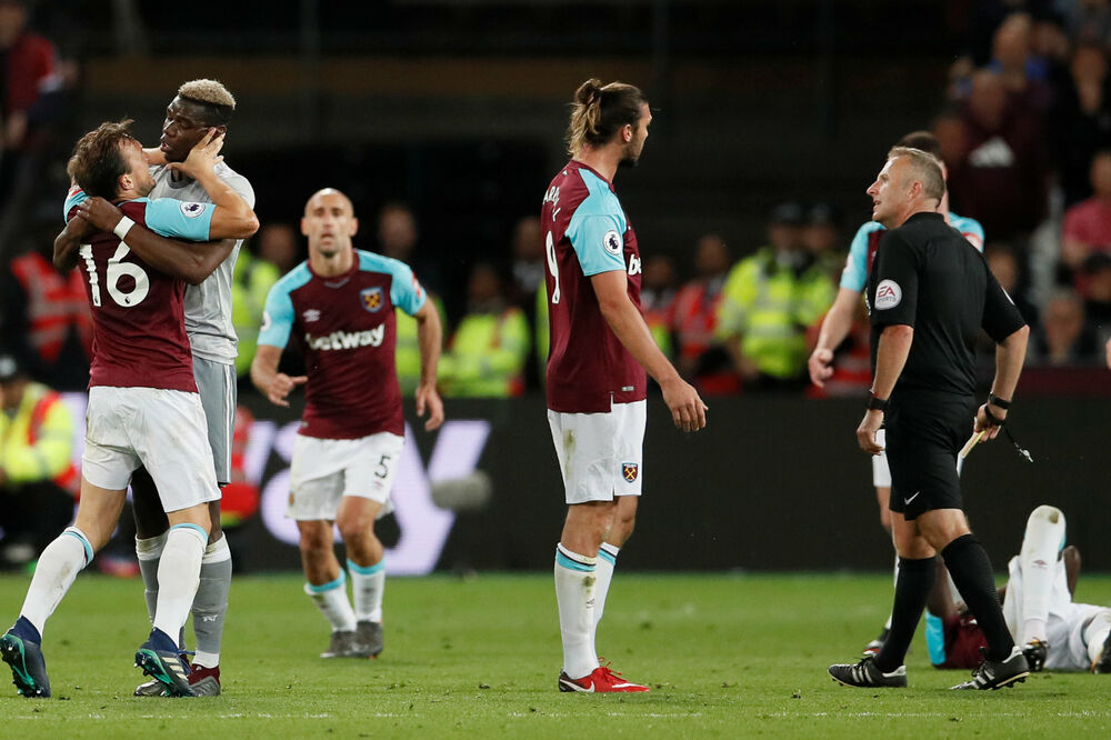 Mark Nobl i Pol Pogba, Foto: Reuters