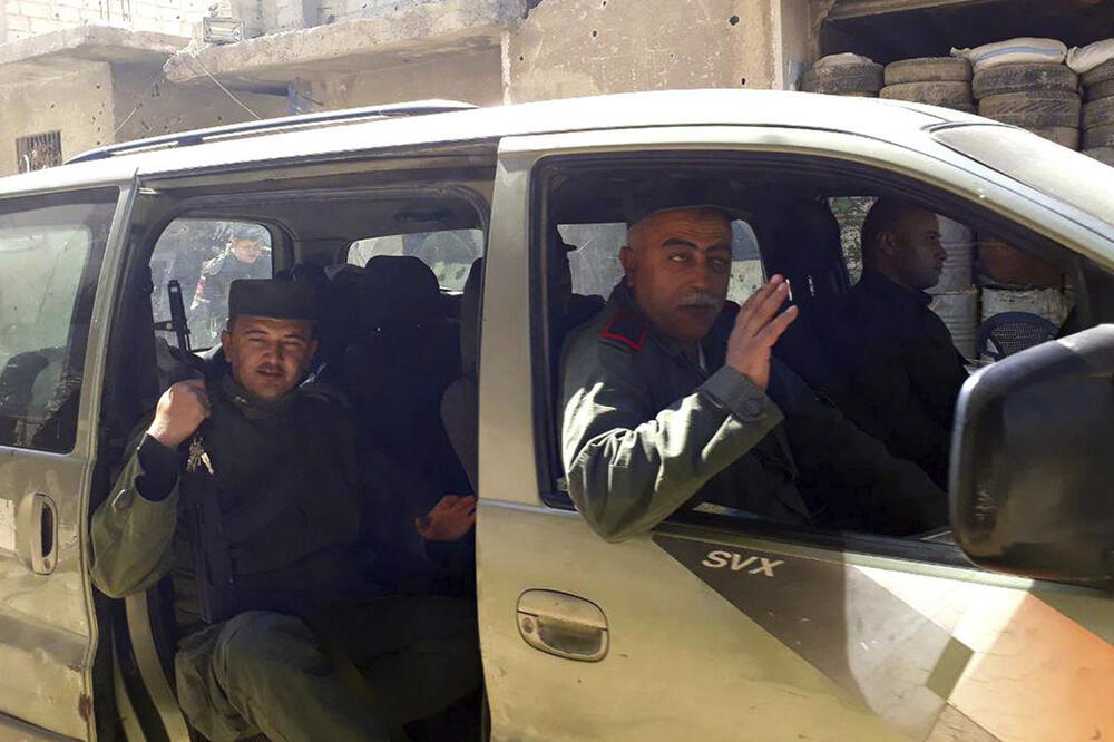 Istočna Guta, sirijska policija, Foto: Beta, SANA via AP