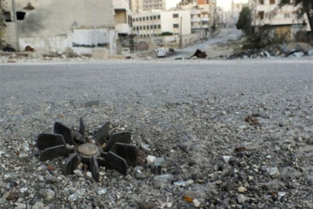 Homs, neeksplodirana granata, Foto: Trust.org