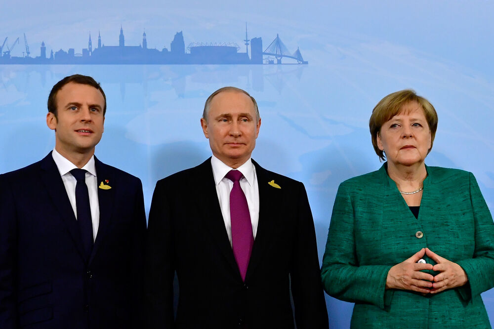 Emanuel Makron, Vladimir Putin, Angela Merkel, Foto: Reuters