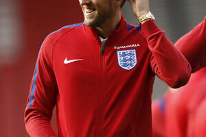 Kejnu kapitenska traka u meču sa Škotskom