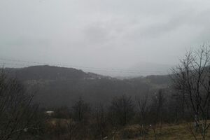 Oblačno, mjestimično sa kišom