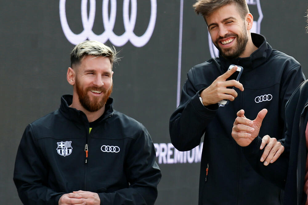 Lionel Mesi i Đerard Pike, Foto: Reuters