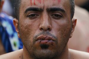 Iranski migranti u Kaleu zašili usta iz protesta