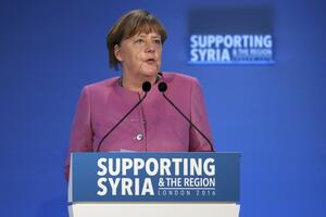Merkel: Davanje azila Iračanima i Sirijcima dio napora da se...