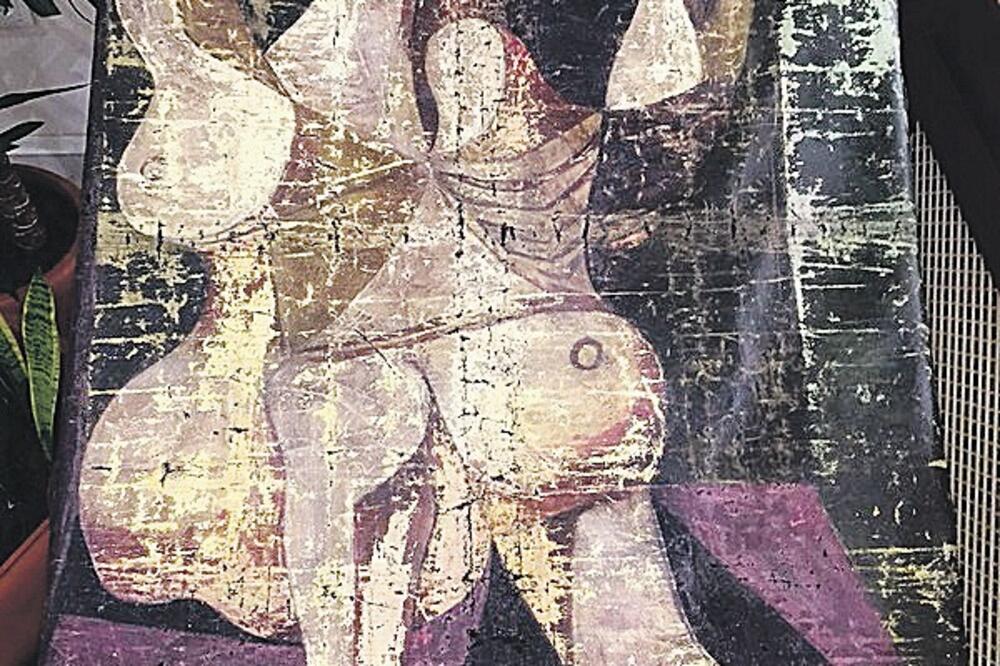 Žena koja se češlja, Foto: Beta-AP