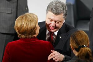 Porošenko, Merkelova i Oland o primjeni Minskih sporazuma