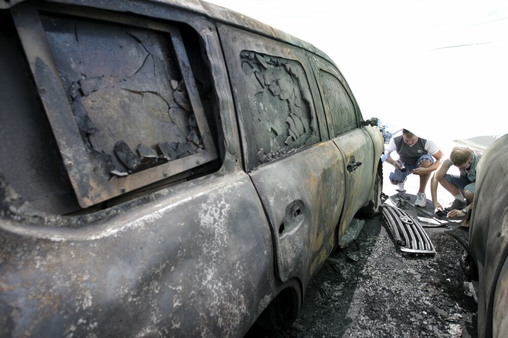 Zapaljeno vozilo, OEBS, Ukrajina, Foto: Reuters