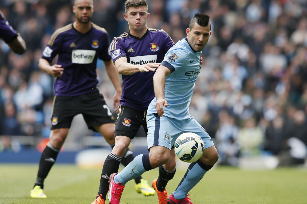 Aron Kresvel i Serhio Aguero, Foto: Reuters