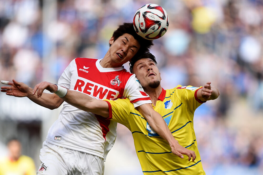 Juja Osako i Ermin Bičakčić, Foto: Beta/AP