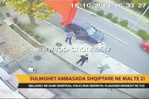 Policajac mirno gledao huligane dok su kamenovali ambasadu Albanije