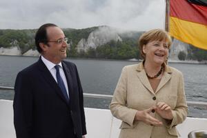 Posao može da sačeka: Merkel i Oland spremni za utakmicu Francuska...