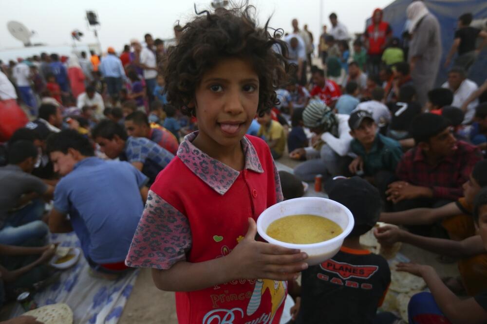 Izbjeglice, hrana, Foto: Reuters