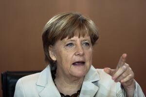 Merkelova: Putin da prizna rezultate izbora u Ukrajini