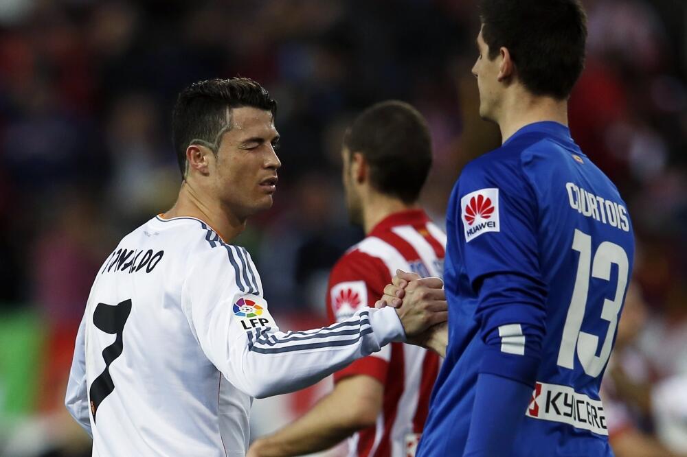 Tibo Kurtoa i Kristijano Ronaldo, Foto: Reuters
