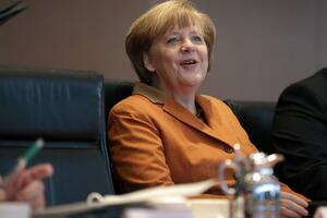 Merkel: Demokratije moraju     služiti kao primjer