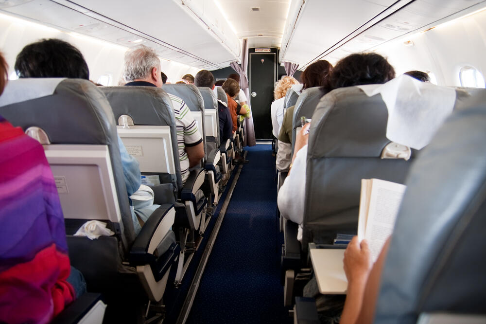 Avion, putnici, Foto: Shutterstock