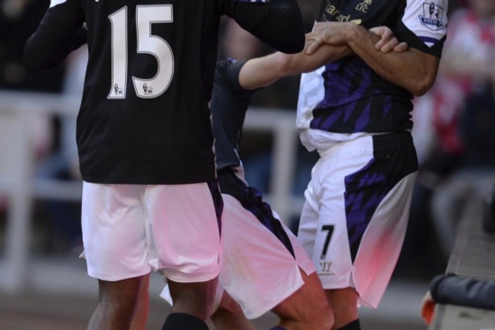 Luis Suares i Danijel Staridž, Foto: Reuters