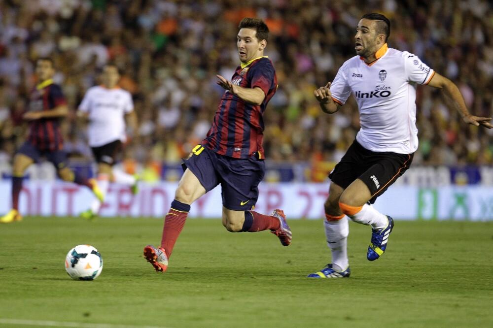 Lionel Mesi i Adil Rami, Foto: Reuters