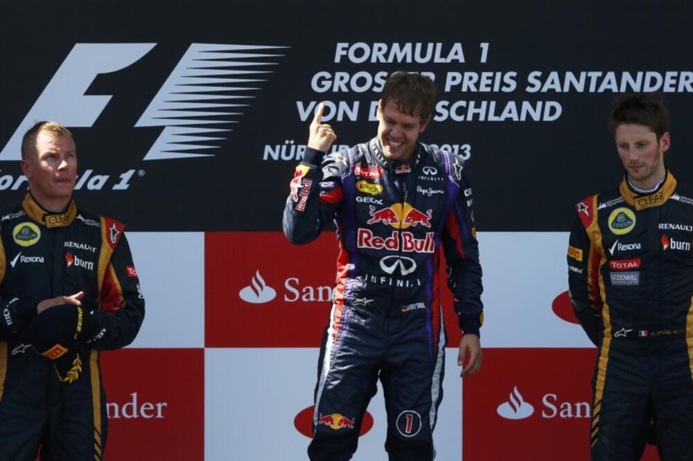 Sebastijan Fetel i Kimi Raikonen, Foto: Reuters