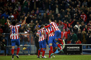 Tijesne pobjede Atletiko Madrida i Valensije