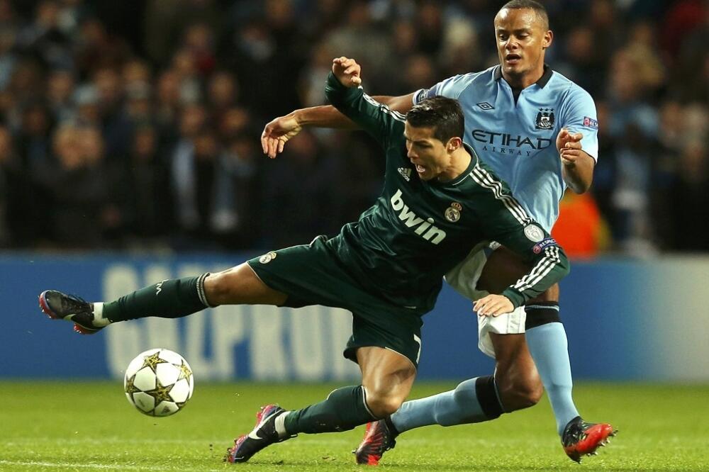 Vensan Kompani i Kristijano Ronaldo, Foto: Reuters