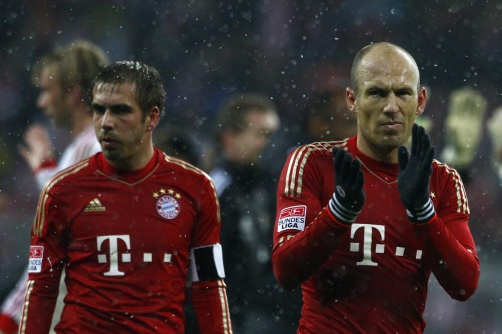 Filip Lam i Arjen Roben, Foto: Reuters