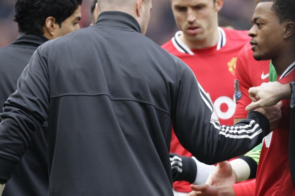 Luis Suares i Patris Evra, Foto: Beta/AP