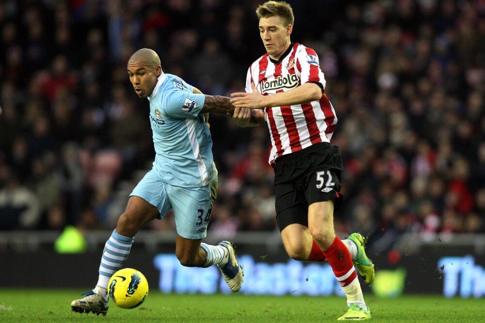 Niklas Bendtner i Najdžel de Jong, Foto: Beta/AP