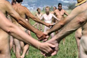 About 250 naked environmental activists shamelessly protested in the meadow