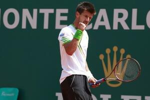 Melcer izbacio Federera