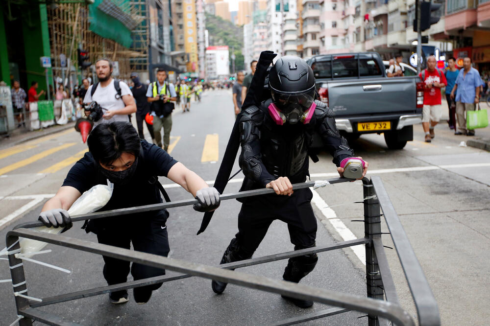 Ah Lung (desno) pripada novoj vrsti demonstranata u Hong Kongu, Foto: Reuters