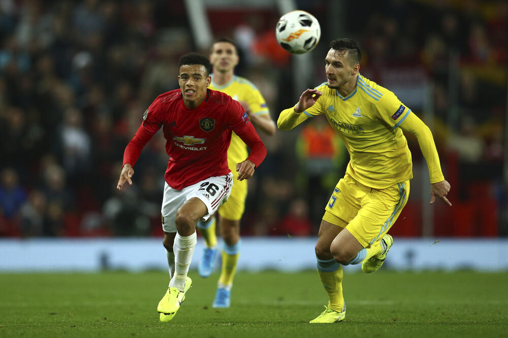 Žarko Tomašević u duelu sa Grinvudom iz Mančester junajteda, Foto: Beta/AP