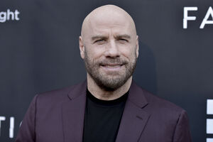 Travolta igra Monopol sa pravim novcem