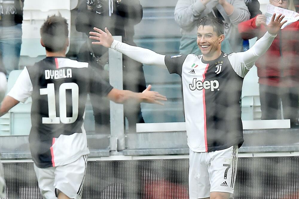Dibala i Ronaldo slave, Foto: Alessandro Di Marco