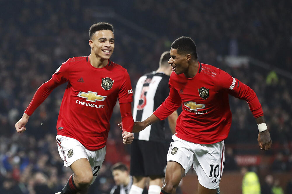 Mejson Grinvud i Markus Rašford slave gol, Foto: Beta/AP