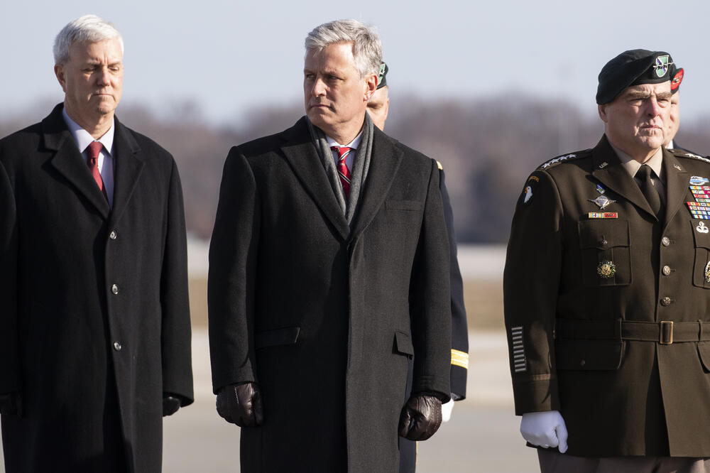 Robert O'Brajen (u sredini), Foto: AP