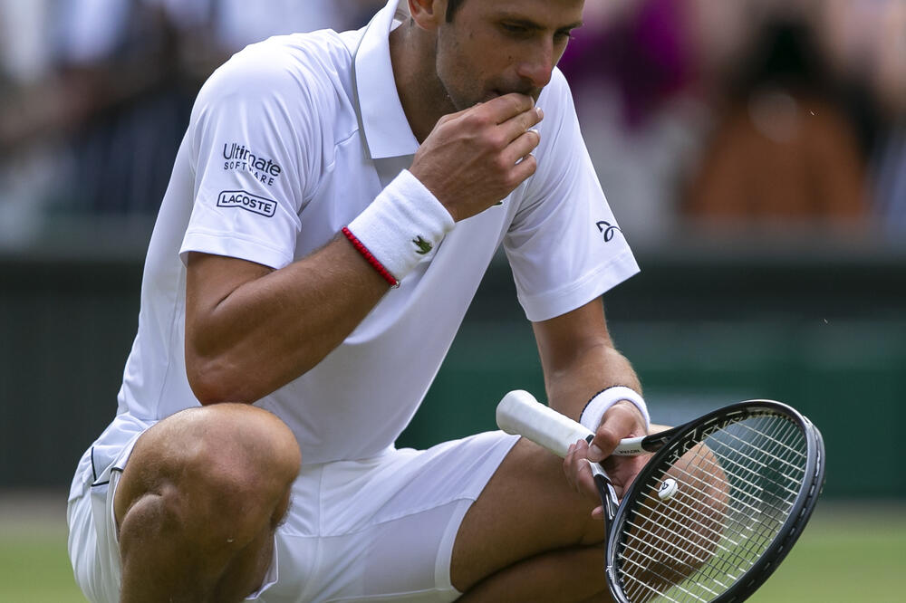Novak Đoković nakon pobjede nad Federerom prošle godine u finalu Vimbldona, Foto: Xinhua News Agency