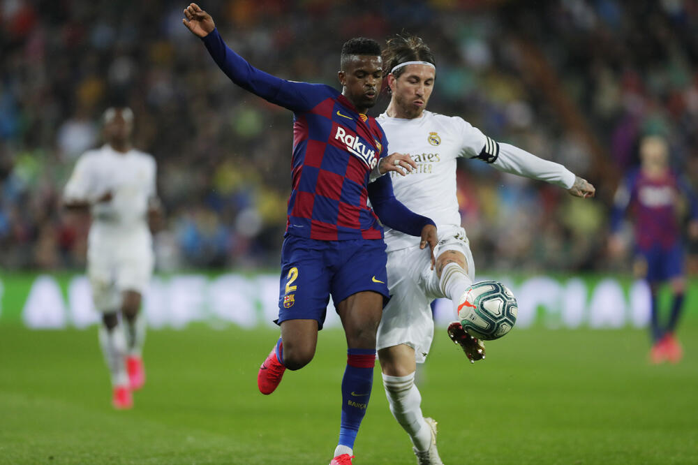 Nelson Semedo u duelu sa Ramosom, Foto: Manu Fernandez