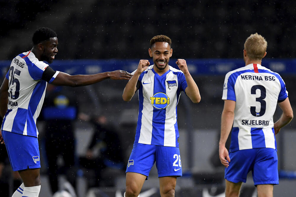 Kunja slavi treći gol, Foto: Stuart Franklin