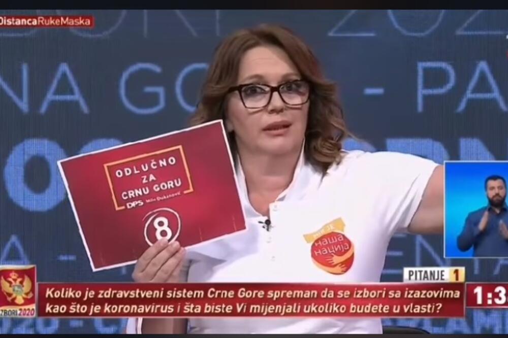 Ćirović pokazuje logo DPS, Foto: Facebook