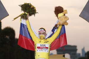 Tour de France champion's yellow jersey sold for charity
