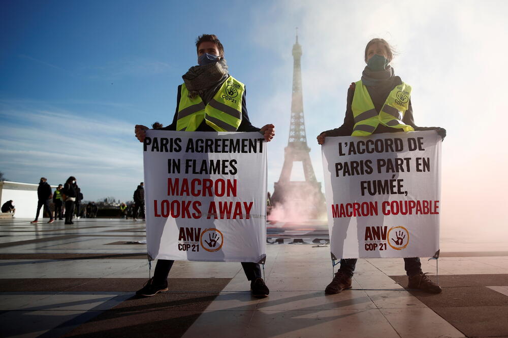 Aktivisti na demonstracijama u Parizu povodom godišnjice sporazuma o klimi, Foto: Reuters